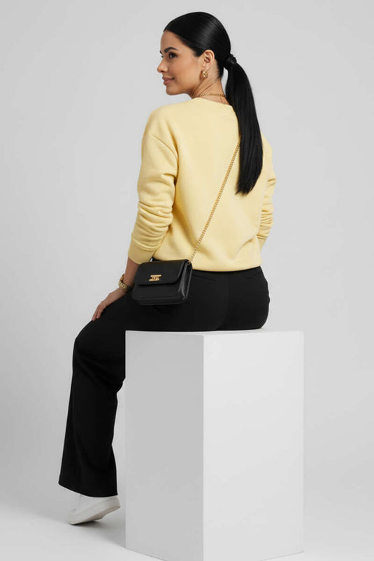 سويت شيرت أصفر أساسي بأكمام منسدلة بثلاثة خيوط