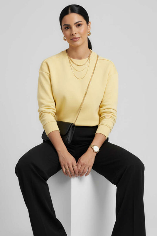 سويت شيرت أصفر أساسي بأكمام منسدلة بثلاثة خيوط