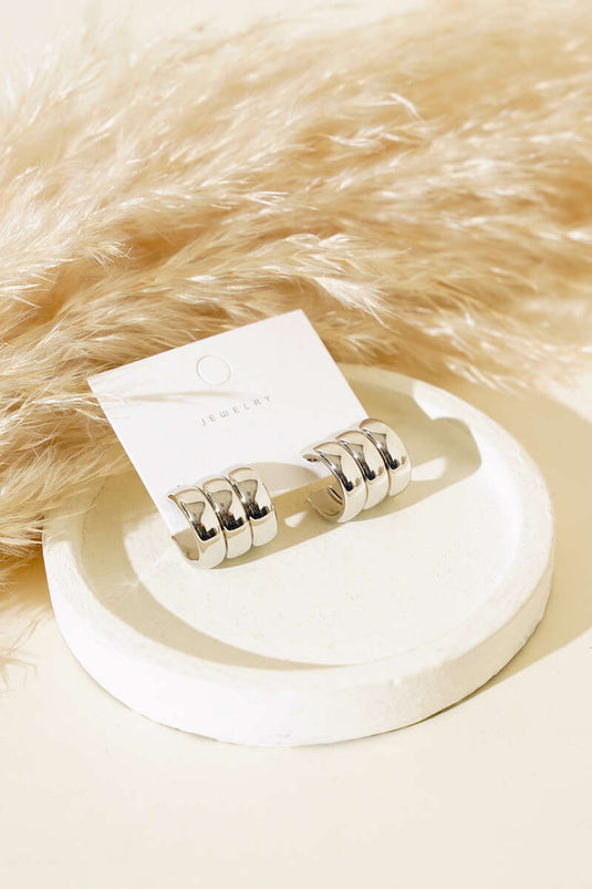 Boucles d'oreilles créoles triple effet argentées