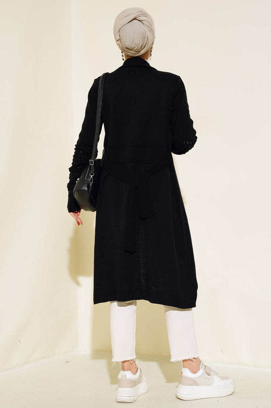 Gilet long noir à manches longues avec cordons de serrage aux poignets en raisin