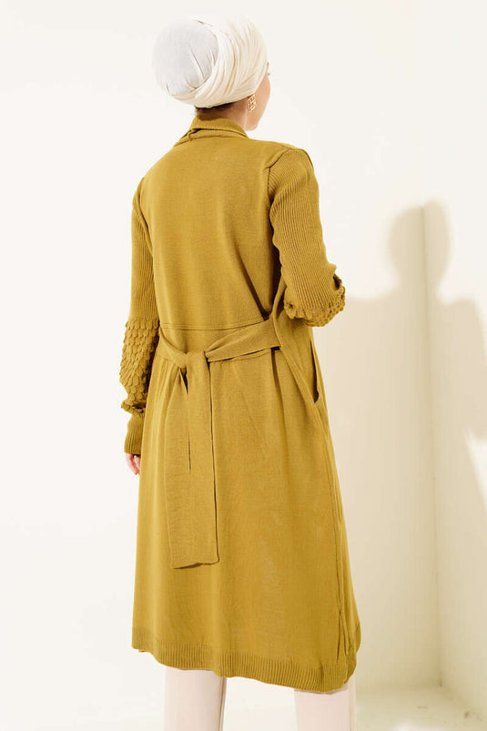 كارديغان طويل بأكمام ضيقة ورباط عند المعصم بلون زيتوني