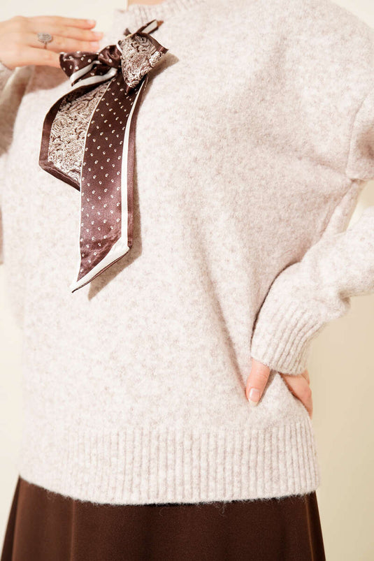 Pull en maille à longue écharpe beige