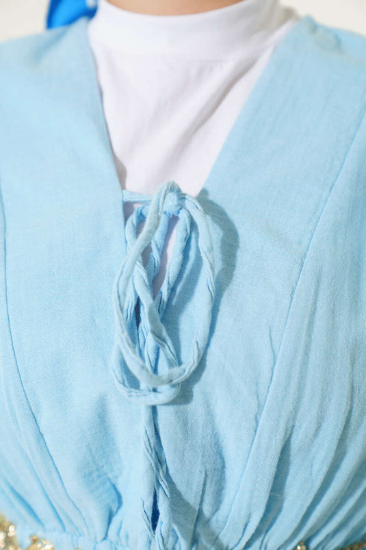 فستان برباط وفتحة رقبة على شكل حرف V أزرق ثلجي