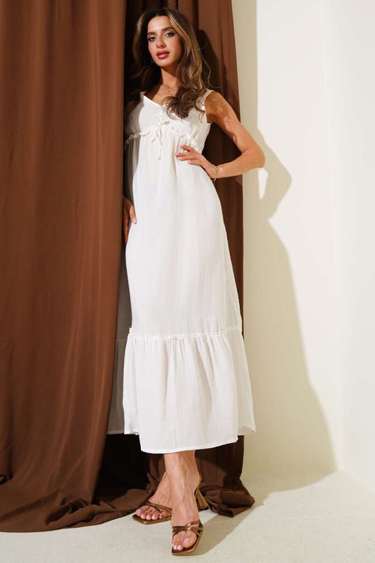 فستان موسلين بياقة على شكل حرف V وخصر مطاطي، لون بيج فاتح