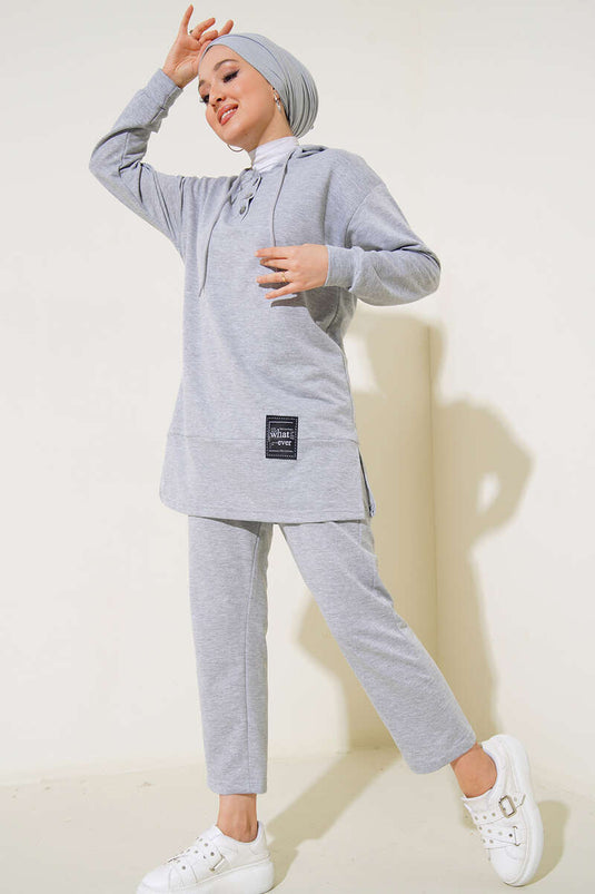 Ensemble deux pièces à capuche avec emblème What Ever, gris