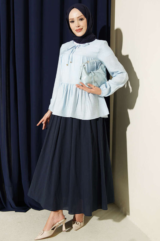 Blauwe Blouse Met Strikdetail En Elastische Manchetten