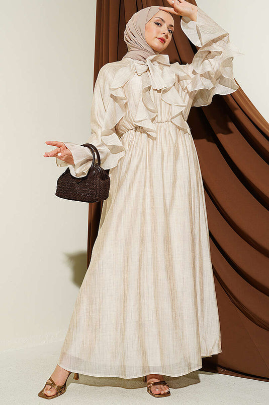 Robe beige à volants avec col noué