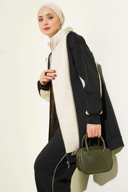 Completo due pezzi nero con colletto con cerniera e finiture