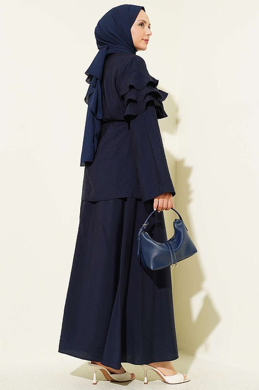 Ensemble deux pièces avec jupe à volants col montant bleu marine