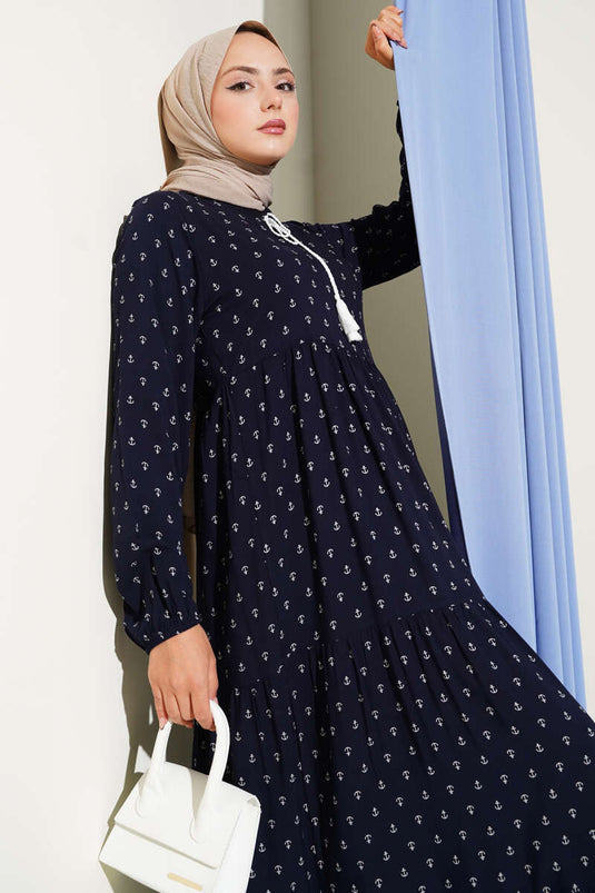 Marineblaues Kleid mit Ankermuster und Kordelzugkragen