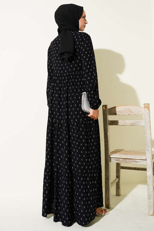 Schwarzes Kleid mit Ankermuster und Kordelzugkragen