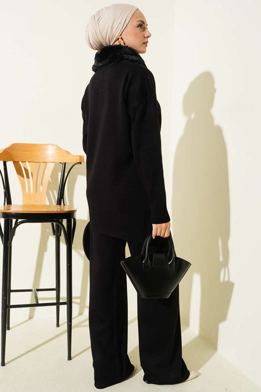 Completo due pezzi in maglia con collo in pelliccia e cerniera, nero