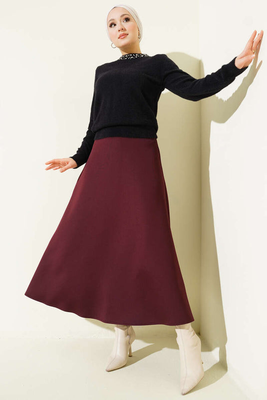 Pull noir avec col et barbe ornés de pierres