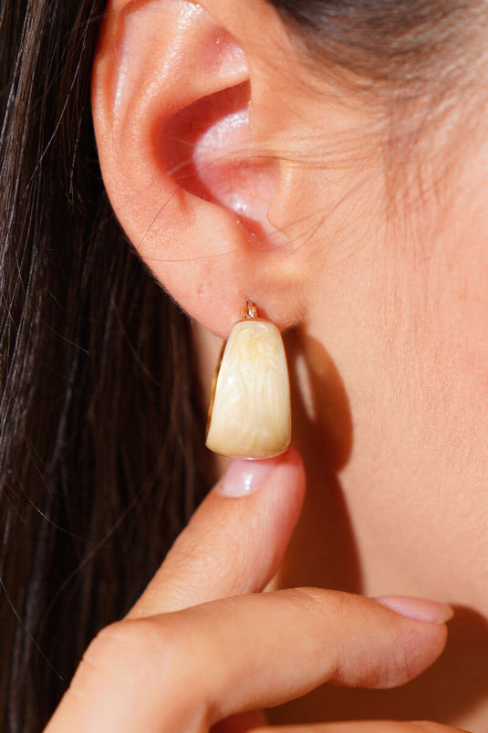 Boucles d'oreilles dorées beiges