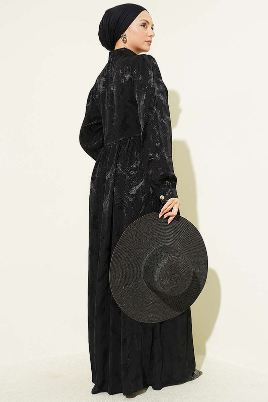 Robe jacquard noire à boutons avec lien au cou