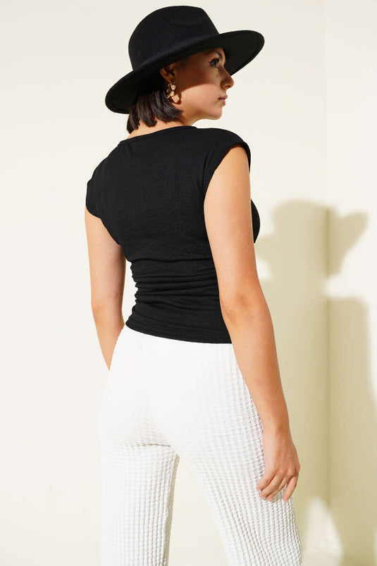 Chemisier froncé noir à fronces latérales