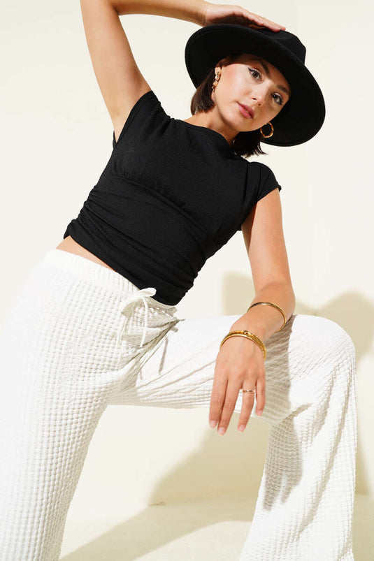 Chemisier froncé noir à fronces latérales