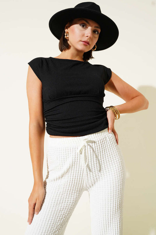 Chemisier froncé noir à fronces latérales