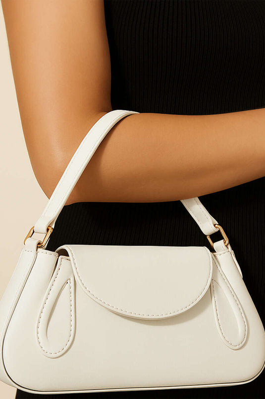 Sac en cuir verni blanc avec fermeture à pression latérale