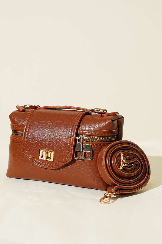 Sac à fermeture éclair latérale avec détail de verrou, couleur tabac