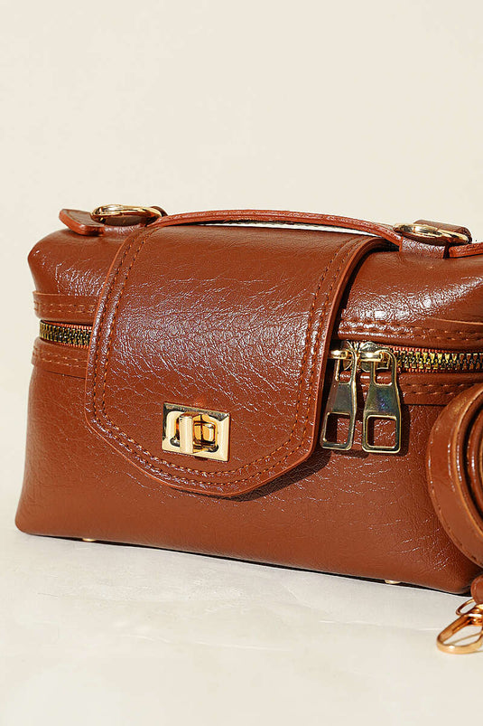 Sac à fermeture éclair latérale avec détail de verrou, couleur tabac