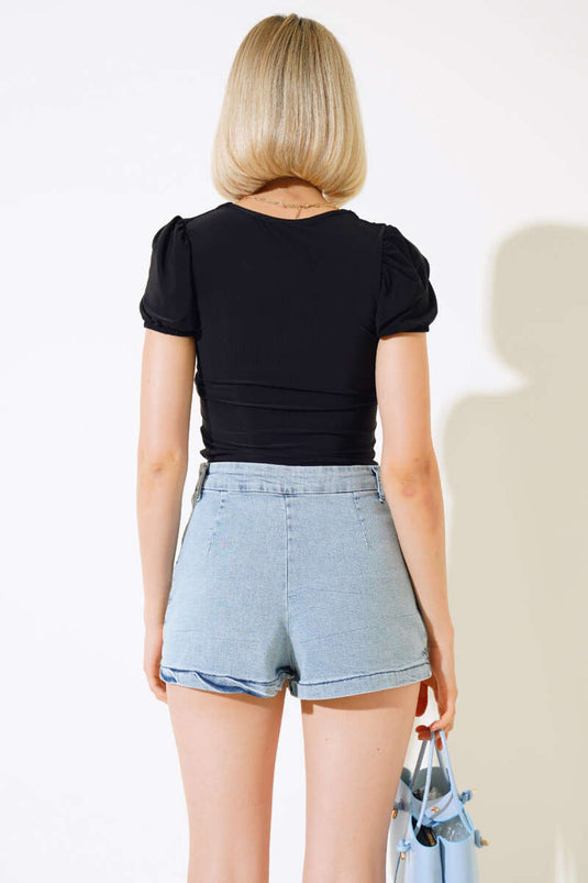 Jupe-short en jean bleu avec fermeture éclair sur le côté