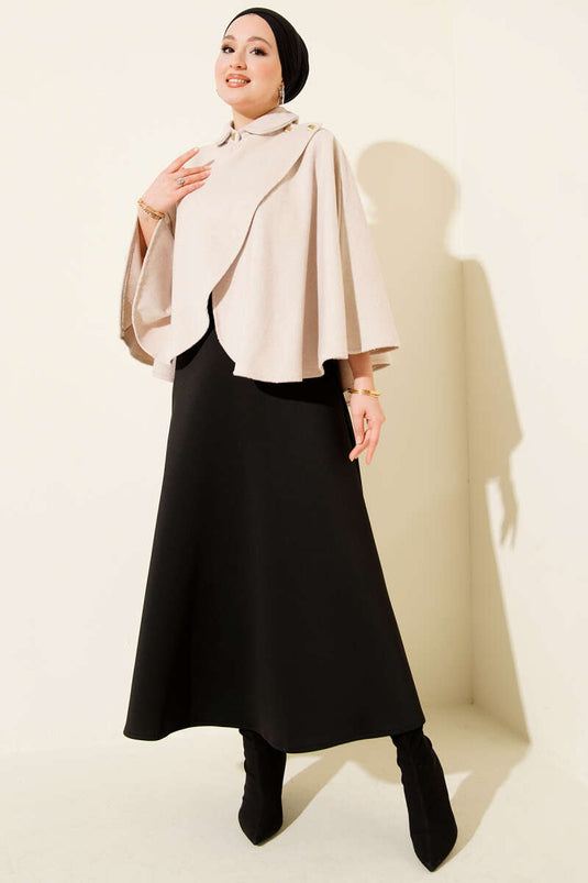 Poncho en cachemire beige avec boutons latéraux dorés