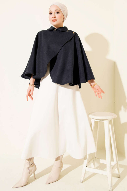 Poncho en cachemire bleu marine avec boutons dorés sur les côtés