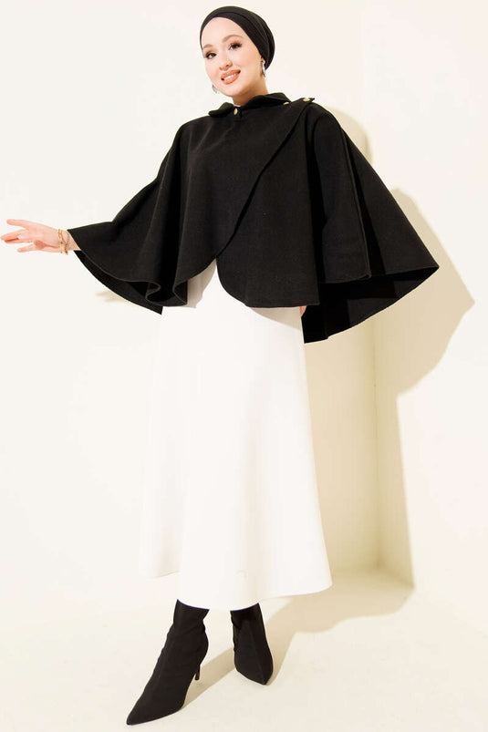 Poncho en cachemire noir avec boutons dorés sur les côtés