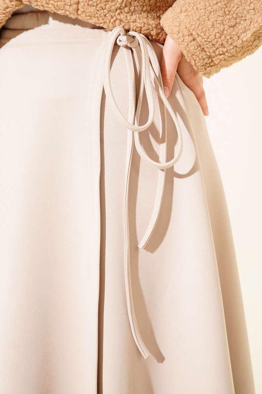 Jupe de plongée beige avec lien latéral