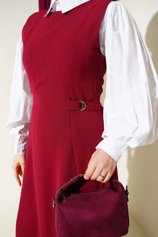 فستان بدون أكمام مزين بتفاصيل يان توكا بلون خمري