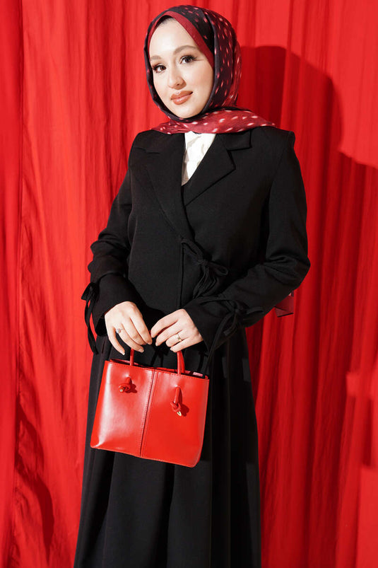 Ensemble deux pièces jupe et veste à lacets latéraux noir