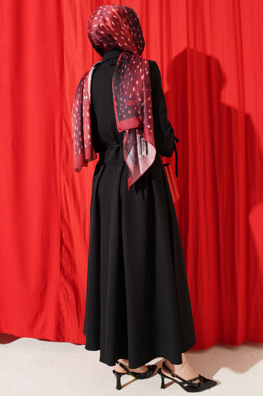 Ensemble deux pièces jupe et veste à lacets latéraux noir