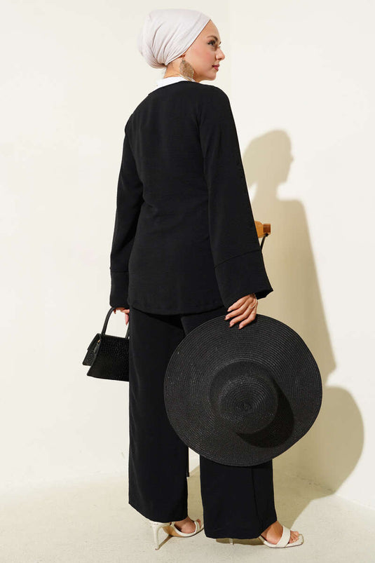 بدلة أيروبين من قطعتين برباط جانبي باللون الأسود