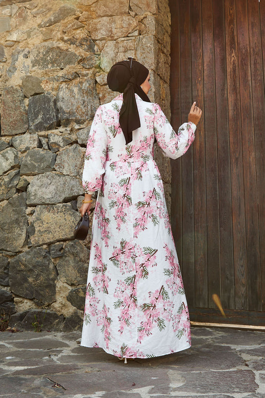 فستان مودال بنمط زهور ورباط جانبي وردي