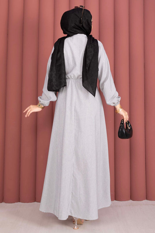 Robe modeste rayée à nouer sur le côté noire