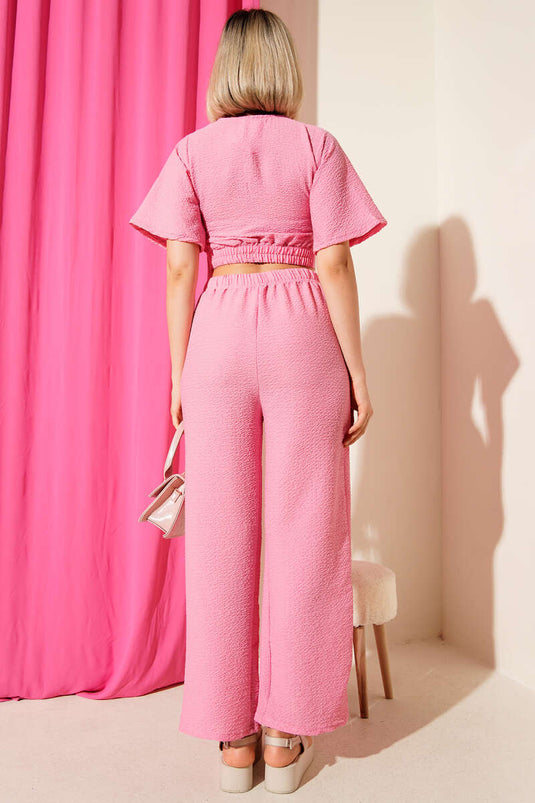 طقم قطعتين قصير برباط جانبي، لون وردي