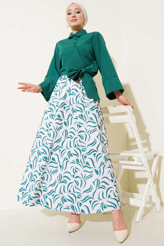 Traje de dos piezas con falda y lazo lateral color esmeralda