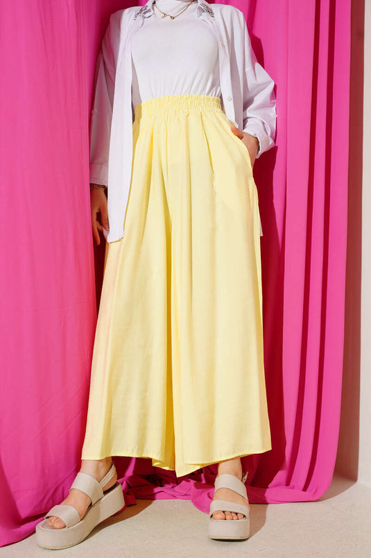 بنطلون تنسل كاجوال مع جيوب جانبية باللون الأصفر