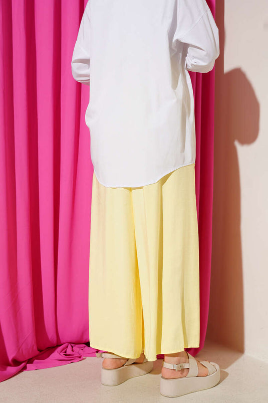 بنطلون تنسل كاجوال مع جيوب جانبية باللون الأصفر