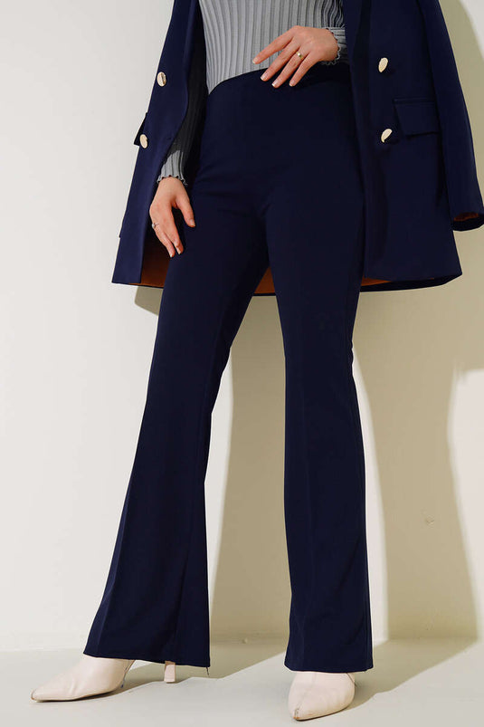 Pantalon bleu marine à jambe évasée et fermeture éclair sur le côté