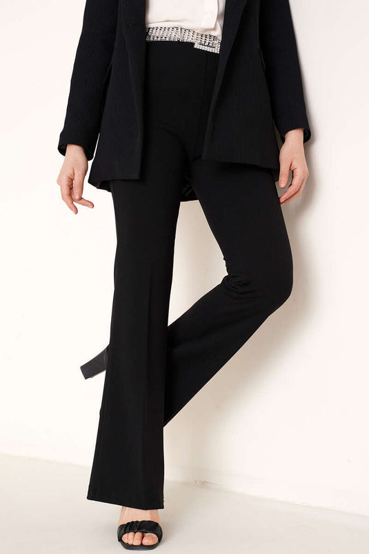 Schwarze Hose mit seitlichem Reißverschluss