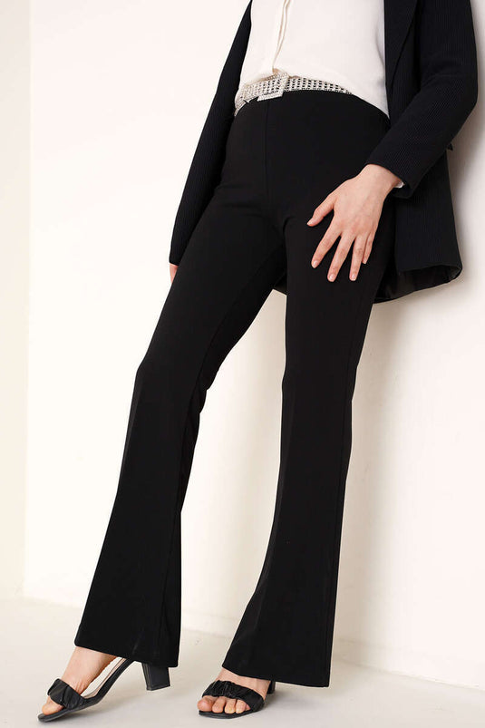 Schwarze Hose mit seitlichem Reißverschluss