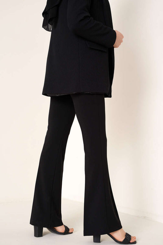 Schwarze Hose mit seitlichem Reißverschluss