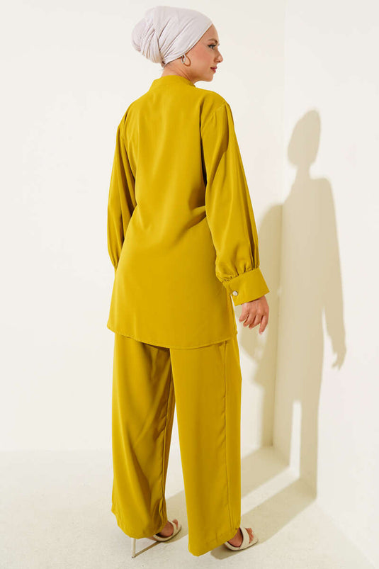 Combinaison deux pièces avec ceinture latérale détaillée vert pétrole