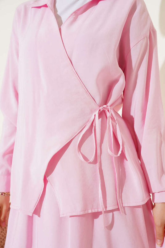 Ensemble deux pièces avec jupe à nouer sur le côté, rose