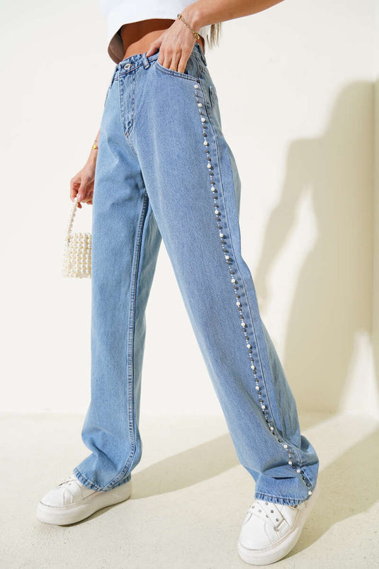 Jean à jambes larges bleu avec perles sur les côtés