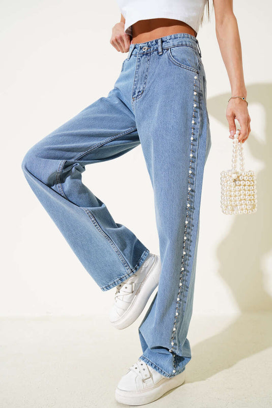 Jean à jambes larges bleu avec perles sur les côtés