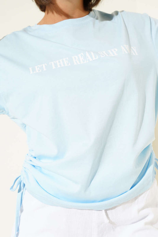 T-shirt bleu ciel avec cordons de serrage sur les côtés