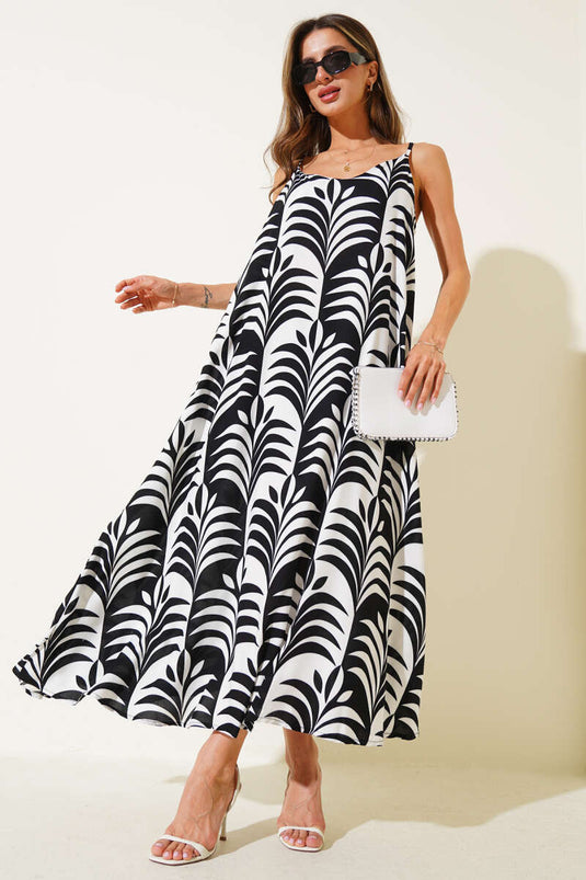 Robe midi à bretelles à motif de feuilles noire